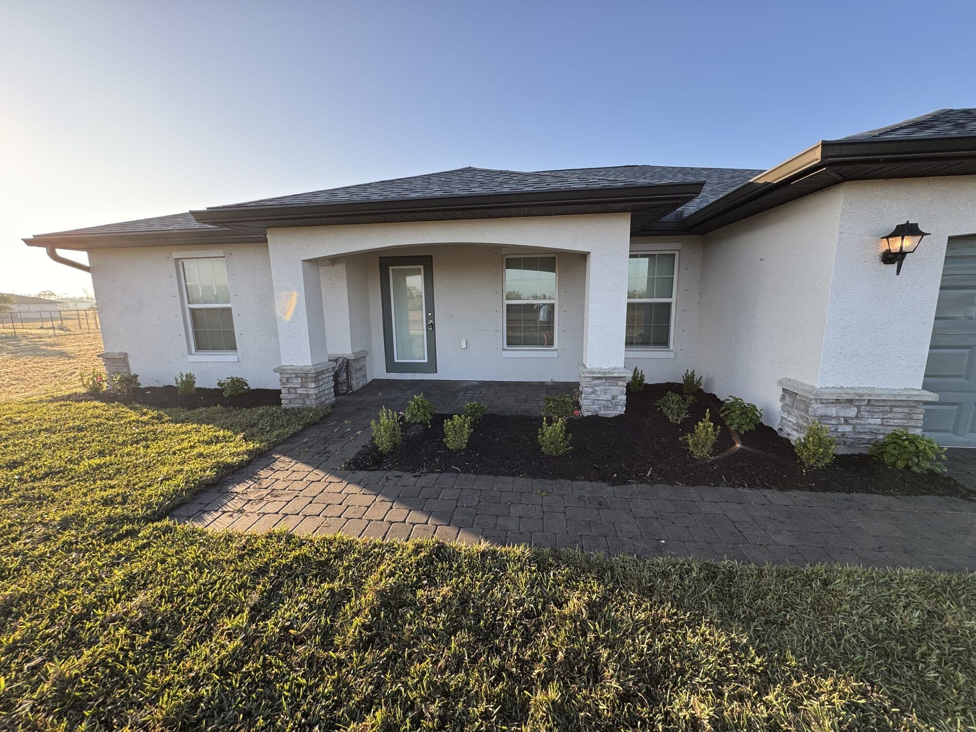 Front-yard landscape package installed at a new Cape Coral home