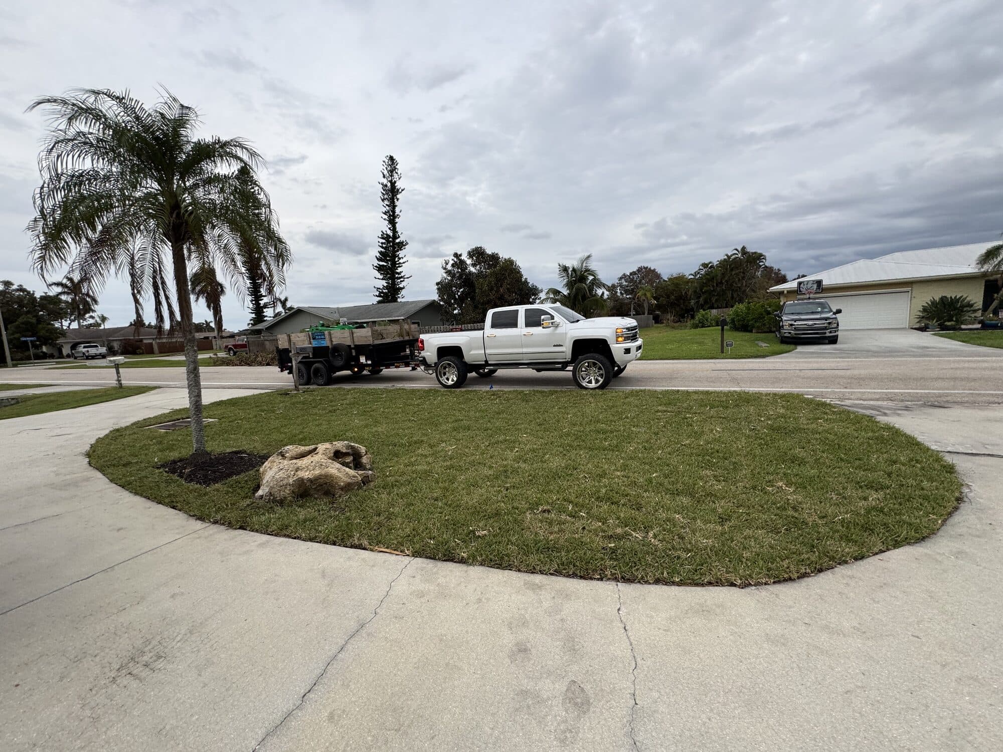 Lawn maintenance corner lot palm Cape Coral